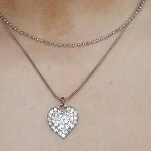 2 Silver necklaces with heart charm